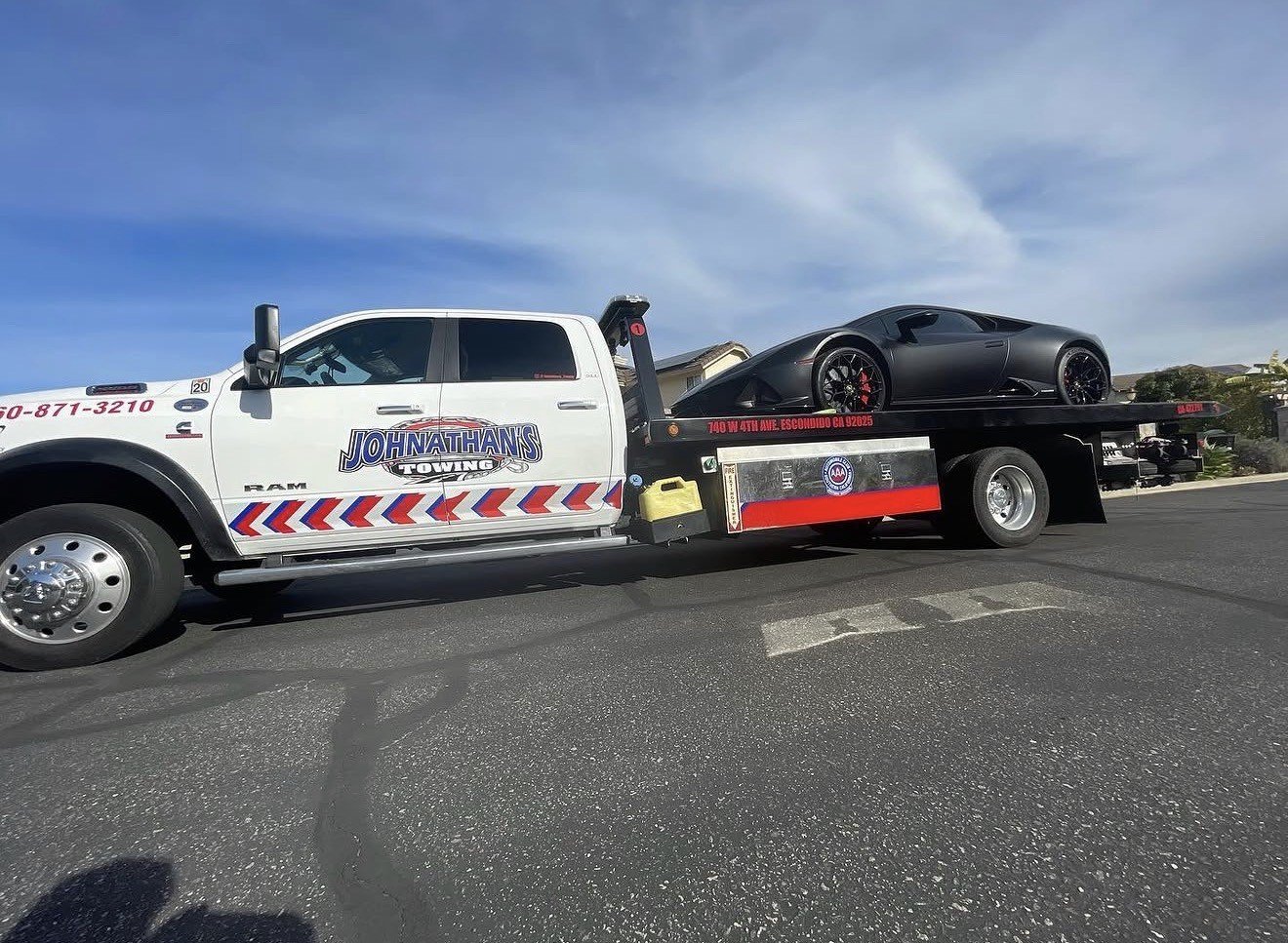 Lamborghini Huracan being loaded onto a flatbed